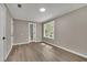Spacious bedroom with large window and access to bathroom at 4913 Windsor Downs Dr, Decatur, GA 30035