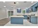 Renovated kitchen, blue cabinets, and light countertops at 4913 Windsor Downs Dr, Decatur, GA 30035