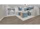 Modern kitchen with blue cabinets and island at 4913 Windsor Downs Dr, Decatur, GA 30035
