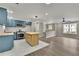Modern kitchen with blue cabinets and a kitchen island at 4913 Windsor Downs Dr, Decatur, GA 30035