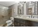 Bathroom with double vanity and a large shower at 5031 Woodridge Way, Tucker, GA 30084