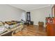 Bedroom with a full-size bed and wood floors at 5031 Woodridge Way, Tucker, GA 30084