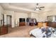 Main bedroom with ample space and a large TV at 100 Canyons Ct, Hampton, GA 30228