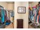 Spacious walk-in closet with ample shelving and hanging space at 100 Canyons Ct, Hampton, GA 30228