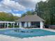 Community pool with pool house and surrounding trees at 1814 Tristan Se Dr, Smyrna, GA 30080