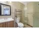 Bathroom with a walk-in shower, toilet and vanity at 729 Cedar Pointe Sw Ct, Marietta, GA 30008