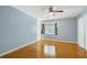 Bright bedroom with hardwood floors and a bay window at 729 Cedar Pointe Sw Ct, Marietta, GA 30008