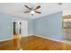 Hardwood floor bedroom with door to bathroom and another bedroom at 729 Cedar Pointe Sw Ct, Marietta, GA 30008