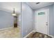 Light blue walls, wood-look floors, and a glass door at 729 Cedar Pointe Sw Ct, Marietta, GA 30008