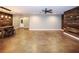 Finished basement with stained concrete floors and a bar area at 2455 Ellijay Ne Dr, Brookhaven, GA 30319