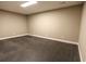 Unfinished basement room with grey carpet at 2455 Ellijay Ne Dr, Brookhaven, GA 30319