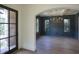 Elegant dining room with dark walls, hardwood floors, and chandelier at 2455 Ellijay Ne Dr, Brookhaven, GA 30319