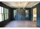 Formal dining room with coffered ceiling and hardwood floors at 2455 Ellijay Ne Dr, Brookhaven, GA 30319