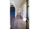 Bright hallway with hardwood floors and arched entryways at 2455 Ellijay Ne Dr, Brookhaven, GA 30319