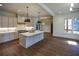 Modern kitchen with large island and marble countertops at 2455 Ellijay Ne Dr, Brookhaven, GA 30319