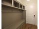 Functional mudroom with built-in bench, cubbies and hooks at 2455 Ellijay Ne Dr, Brookhaven, GA 30319