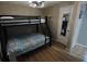 Bedroom with a bunk bed and ample closet space at 2850 Rhett Butler Dr, Douglasville, GA 30135