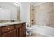 Bathroom with granite counters and tiled shower at 337 Ellis Preserve Sw Ln, Marietta, GA 30064