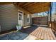 Cozy, covered deck offers privacy with a modern divider and beautiful stone walkway at 337 Ellis Preserve Sw Ln, Marietta, GA 30064