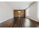 Bright living room featuring luxury vinyl plank flooring and accent wall at 337 Ellis Preserve Sw Ln, Marietta, GA 30064