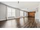 Open living room with hardwood floors and lots of natural light at 337 Ellis Preserve Sw Ln, Marietta, GA 30064