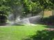 Landscaped grounds with lush greenery and sprinkler system at 3777 Peachtree Ne Rd # 1335, Brookhaven, GA 30319