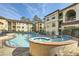 Community pool with spa and lounge chairs at 3777 Peachtree Ne Rd # 1335, Brookhaven, GA 30319