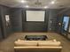 Residential theater room with screen and comfortable seating at 3777 Peachtree Ne Rd # 1335, Brookhaven, GA 30319