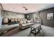 Residential theater room with tiered seating and large screen at 3777 Peachtree Ne Rd # 1335, Brookhaven, GA 30319