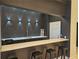 Modern wet bar with sleek design and quartz countertop at 3777 Peachtree Ne Rd # 1335, Brookhaven, GA 30319