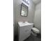 Functional bathroom features a modern vanity, updated fixtures, and tiled flooring at 6625 Starling Sw Pl, Mableton, GA 30126