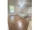 Bright bedroom with hardwood floors and a window providing ample natural light at 6625 Starling Sw Pl, Mableton, GA 30126
