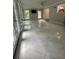 Spacious living area featuring tiled floors, abundant natural light, and views of the outdoors at 6625 Starling Sw Pl, Mableton, GA 30126