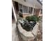 Charming stone water fountain with a pond, adding tranquility to the home's exterior at 6625 Starling Sw Pl, Mableton, GA 30126