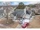 Aerial view of a house with a two-car garage and driveway at 6715 Biscayne Blvd, Rex, GA 30273