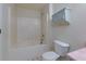 This bathroom has a vanity and toilet, as well as a shower/tub at 6715 Biscayne Blvd, Rex, GA 30273