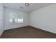 Bedroom featuring neutral walls, a window, and carpet flooring at 6715 Biscayne Blvd, Rex, GA 30273