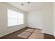 This bedroom has neutral walls and a window that lets in lots of light at 6715 Biscayne Blvd, Rex, GA 30273