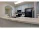 Functional kitchen with laminate countertops, and neutral cabinets at 6715 Biscayne Blvd, Rex, GA 30273