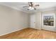 Bright bedroom with hardwood floors and ceiling fan at 955 Juniper Ne St # 4331, Atlanta, GA 30309