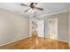 Hardwood floor bedroom with access to bathroom and living area at 955 Juniper Ne St # 4331, Atlanta, GA 30309