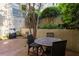 Outdoor grilling area with table and chairs for dining al fresco at 955 Juniper Ne St # 4331, Atlanta, GA 30309