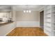 Bright dining room with hardwood floors and built-in shelving at 955 Juniper Ne St # 4331, Atlanta, GA 30309