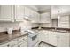 Well-equipped kitchen with white cabinets and granite countertops at 955 Juniper Ne St # 4331, Atlanta, GA 30309