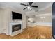 Living room with hardwood floors, fireplace and open floor plan at 955 Juniper Ne St # 4331, Atlanta, GA 30309