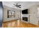 Living room features hardwood floors, fireplace, and large windows at 955 Juniper Ne St # 4331, Atlanta, GA 30309