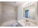 Clean bathroom with marble tile, vanity with quartz countertop and new toilet at 1107 Riverbend Club Se Dr, Atlanta, GA 30339