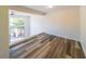 Bright living area with deck access and hardwood-style flooring at 1107 Riverbend Club Se Dr, Atlanta, GA 30339