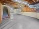 Unfinished basement with high ceilings and ample storage space at 3905 Colonial Sw Trl, Lilburn, GA 30047
