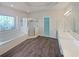 Bathroom with double vanity, shower, and garden window at 3905 Colonial Sw Trl, Lilburn, GA 30047